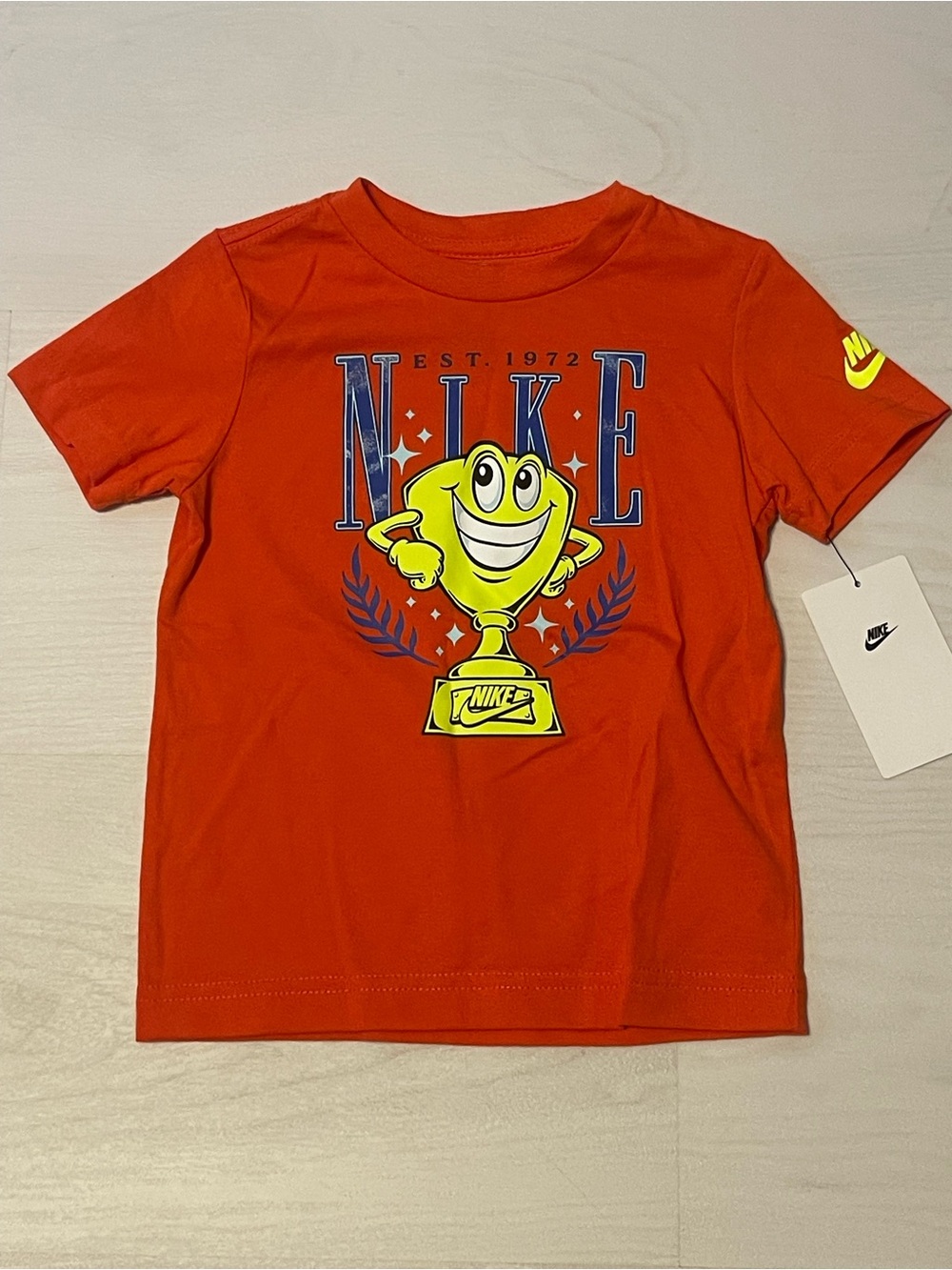 Nike Bright Orange Tee with Yellow Trophy Graphic